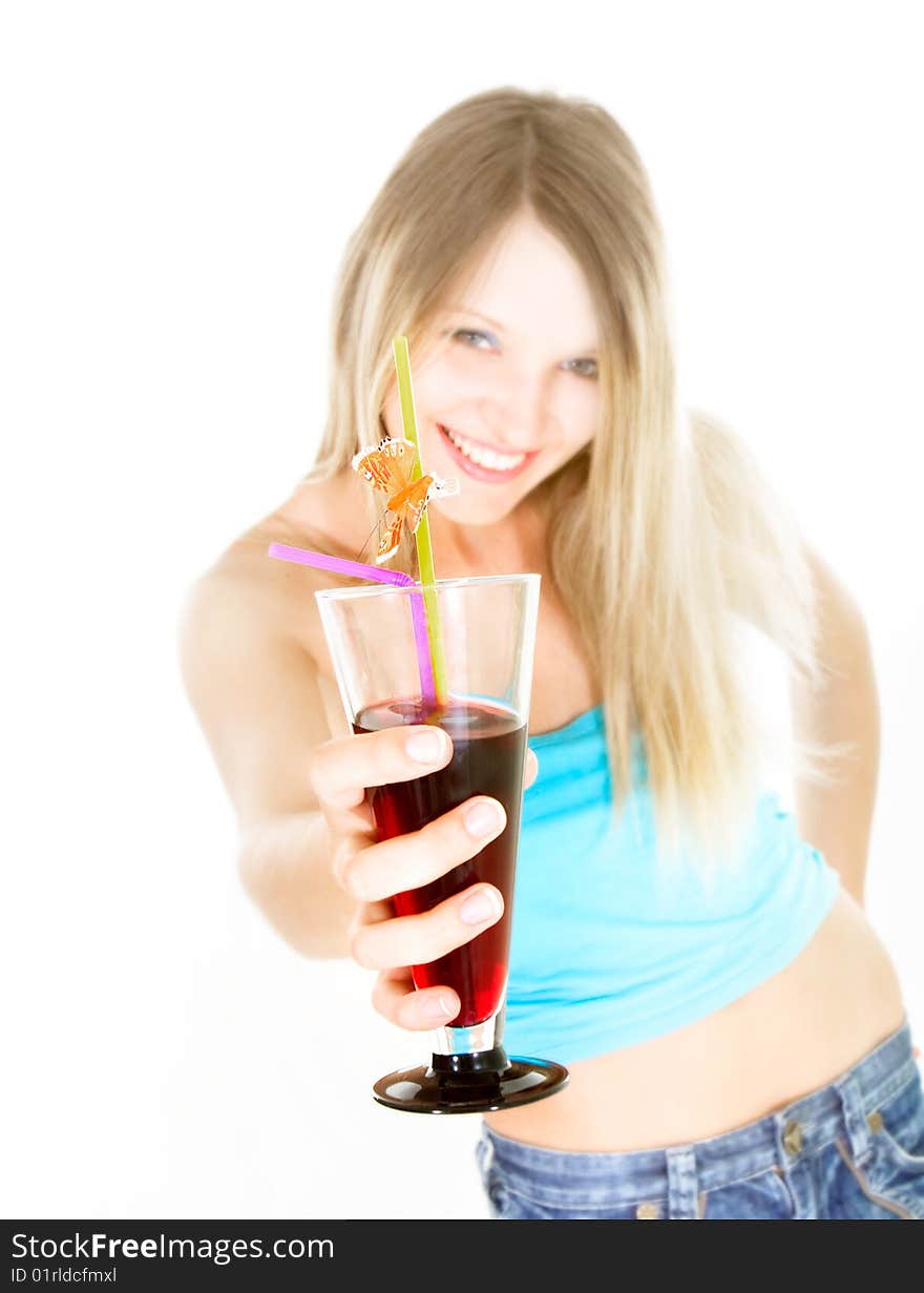 Attractive girl with glass of juice over white, focus on glass