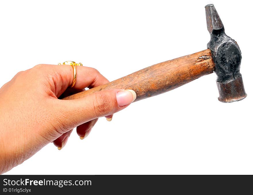 Female hand with hammer isolated on white background.