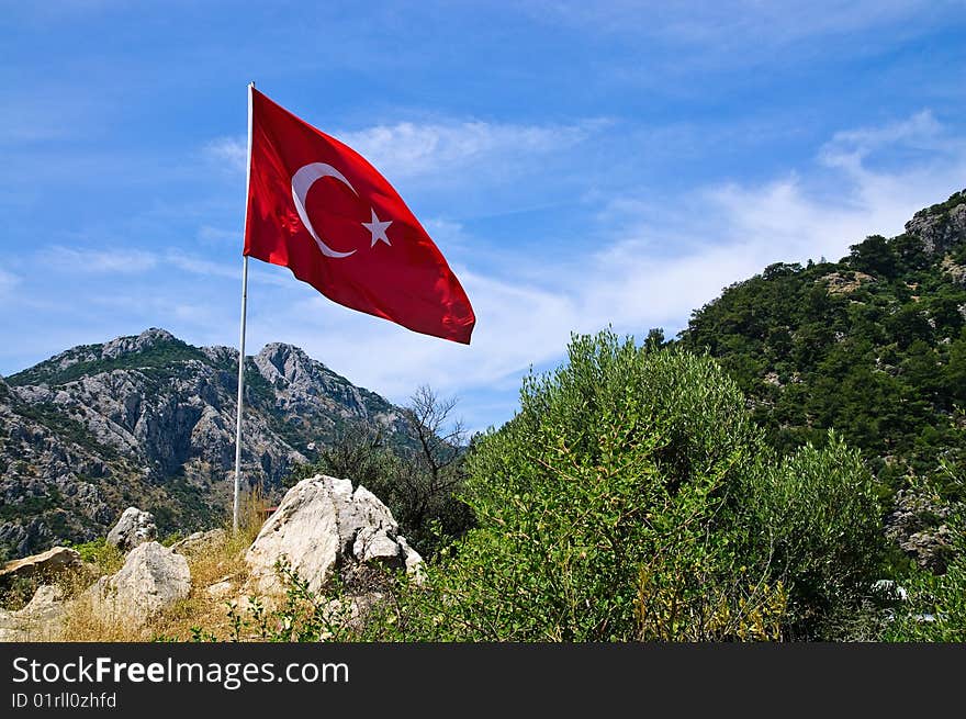 Turkish flag on flagpole. Turkey. Mediterranean Sea