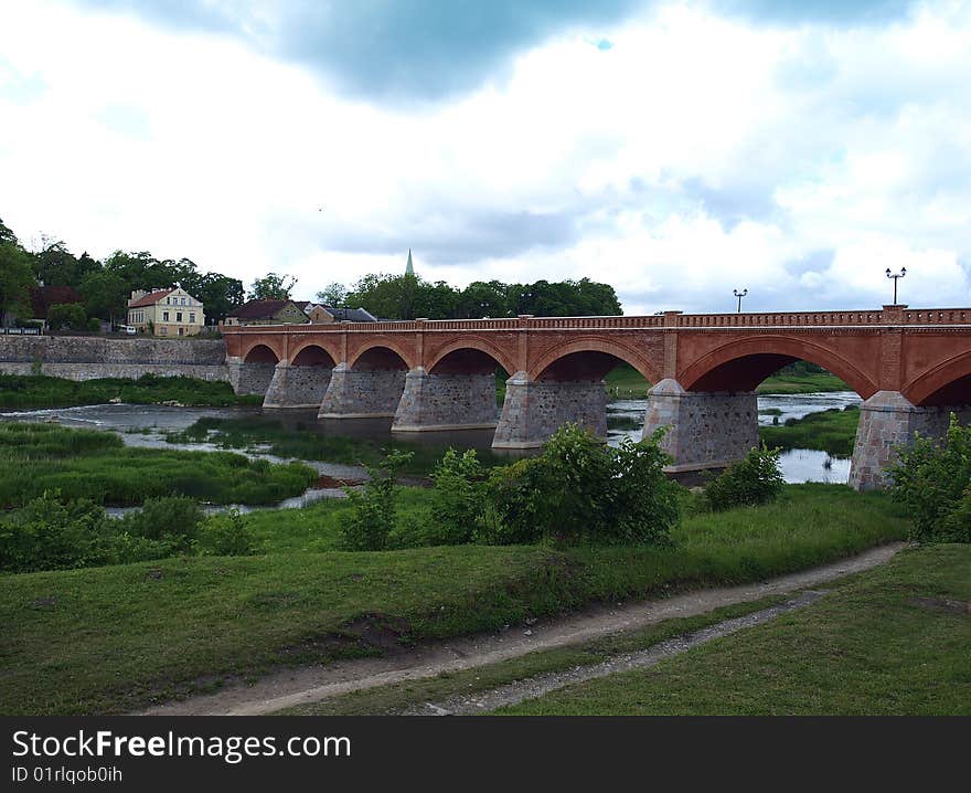 Bridge over Kuldiga,the biggest waterfall in europe. Bridge over Kuldiga,the biggest waterfall in europe.