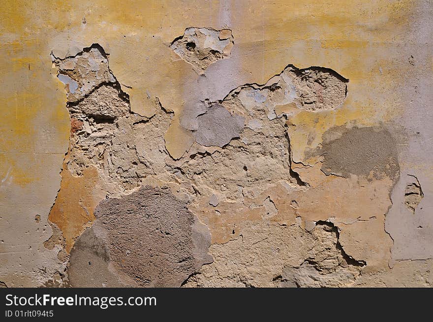 Antique rough ruined wall close up. Antique rough ruined wall close up