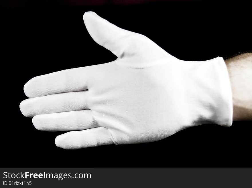 Handshake with a white cotton glove