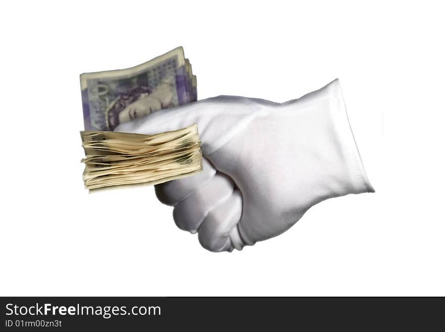 White gloved hand holding twenty pound notes isolated on a white background.