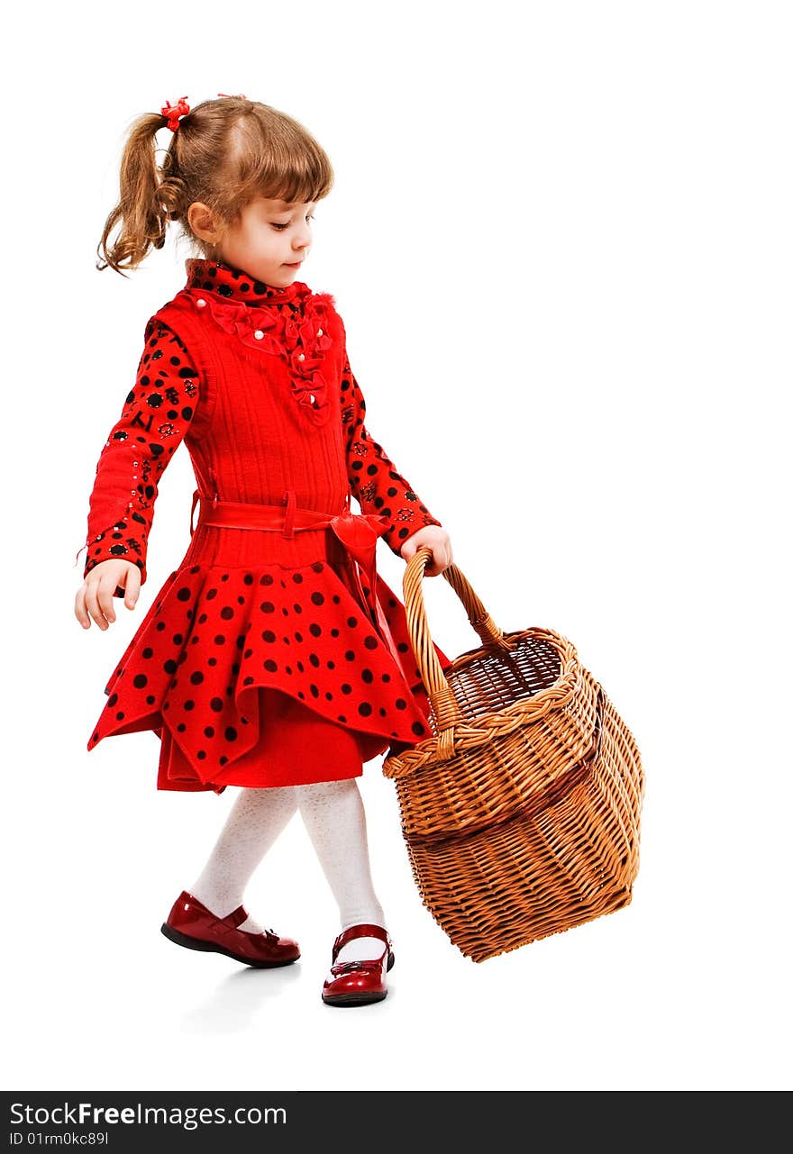 Beautiful little girl in red dress holding basket, isolated on white