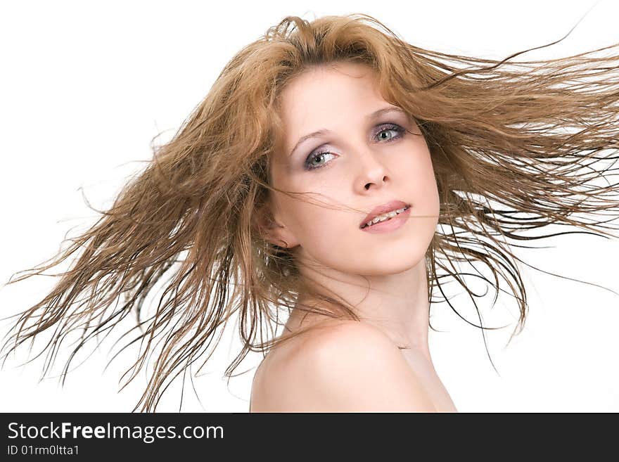 Happy young girl with long flying hair