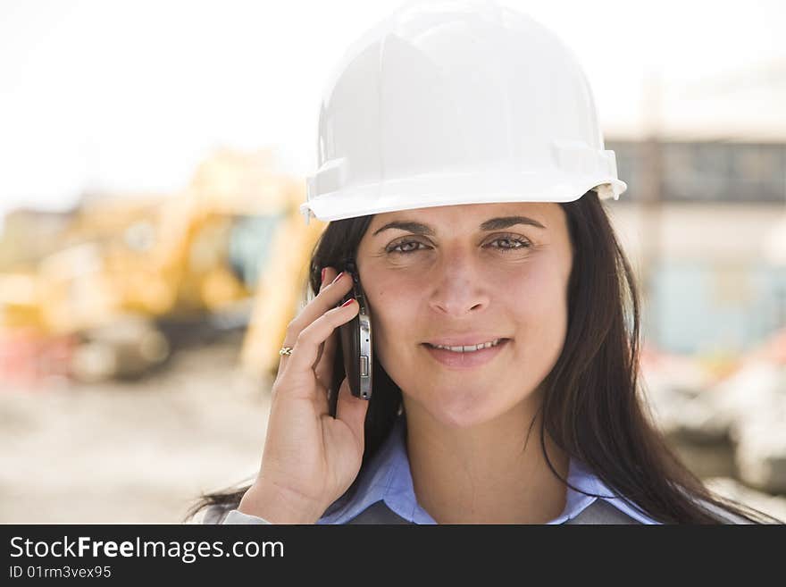 Female worker at a construction site. Female worker at a construction site