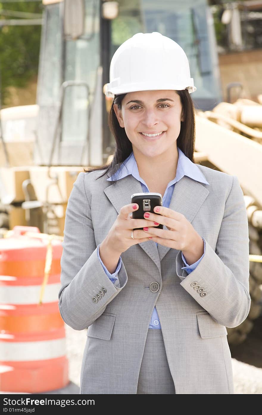 Female worker at a construction site. Female worker at a construction site