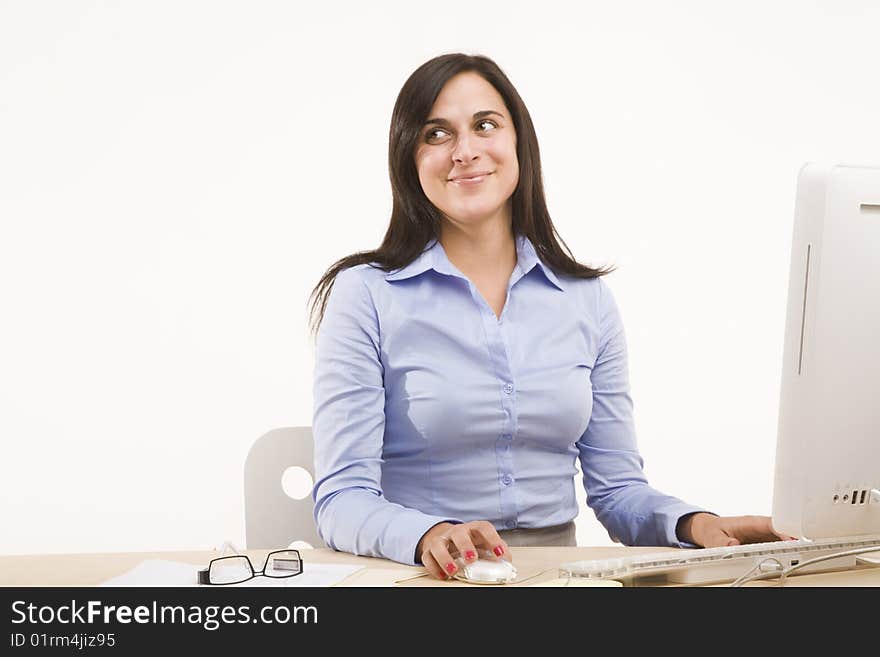 Professional woman sitting at desk. Professional woman sitting at desk