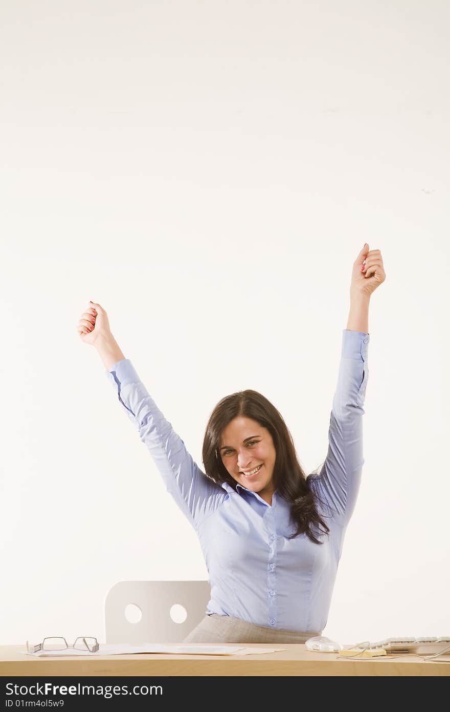 Professional woman sitting at desk. Professional woman sitting at desk