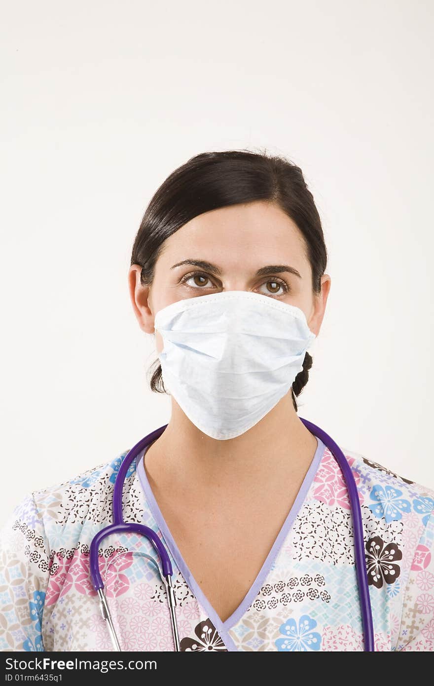 Female medical professional wearing partical mask. Female medical professional wearing partical mask