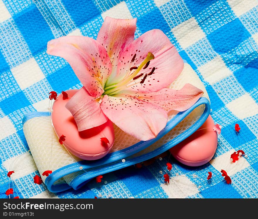 Soap and flower on towel for your design