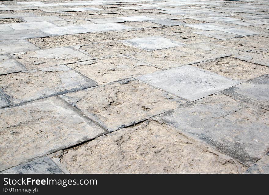 Closeup of aged stone ground. Closeup of aged stone ground