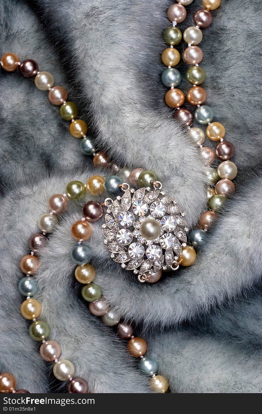 Nacklace with brooch on fur. Nacklace with brooch on fur