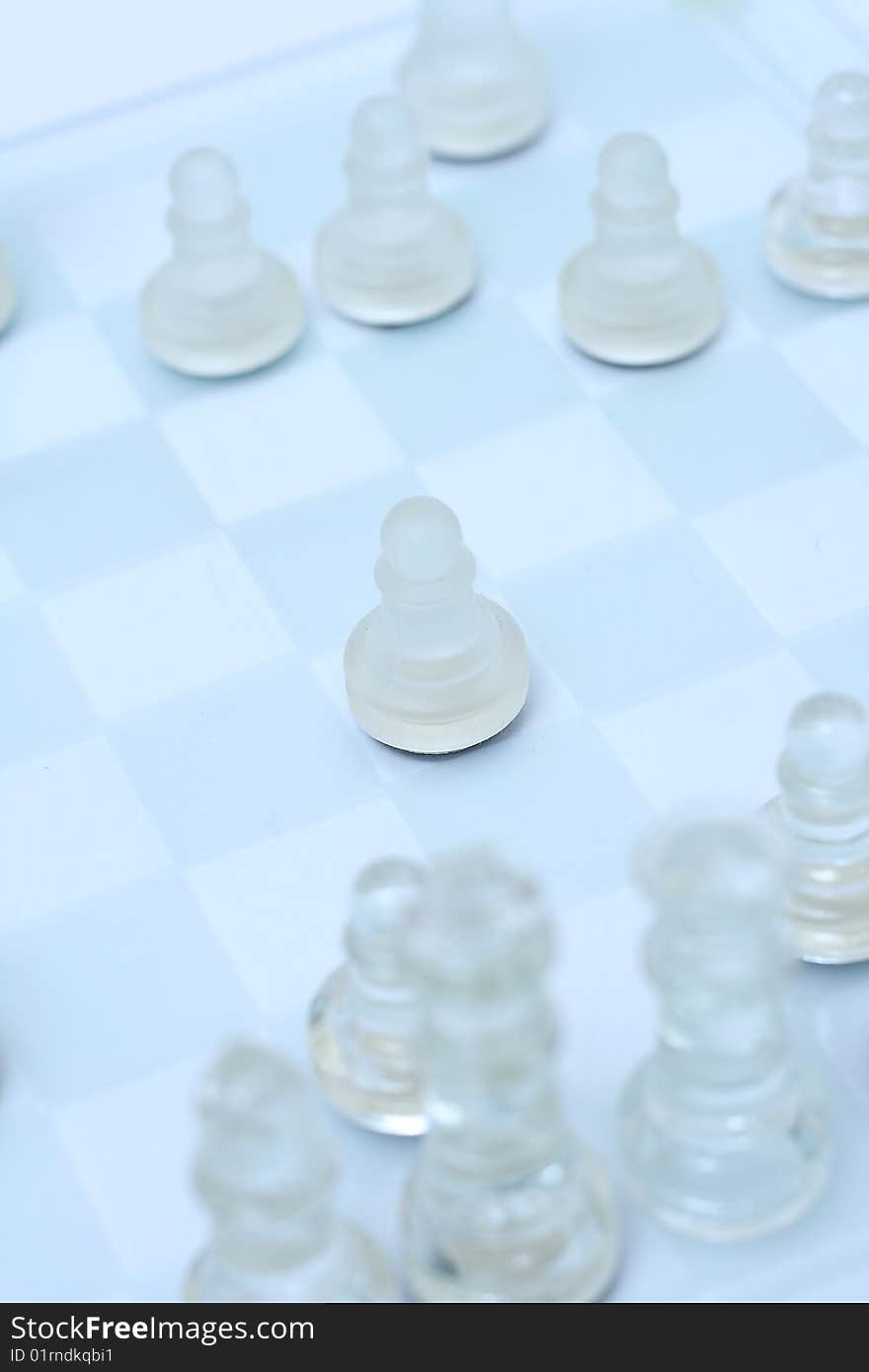 Transparent chess on a light blue background focusing on pawn