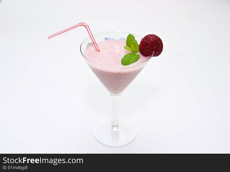 Strawberry smoothie decorated with mint and strawberry