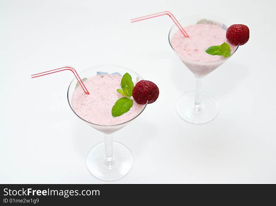 Strawberry smoothie decorated with mint and strawberry