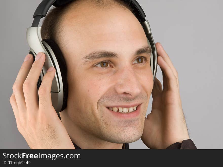 Man listening music in headphones