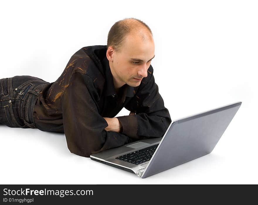 Man with laptop computer over white