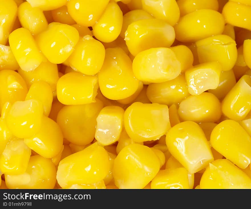 Canned corn as is distributed on a plane in a complete shot