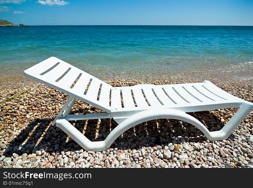 Picture of a plastic tanning bed on the beach of the black sea. Picture of a plastic tanning bed on the beach of the black sea