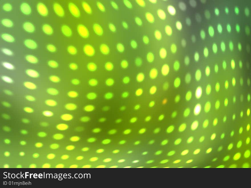 Green abstract background with a pattern from dots. Green abstract background with a pattern from dots