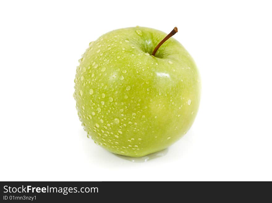 Green apple with droplets isolated on a white background