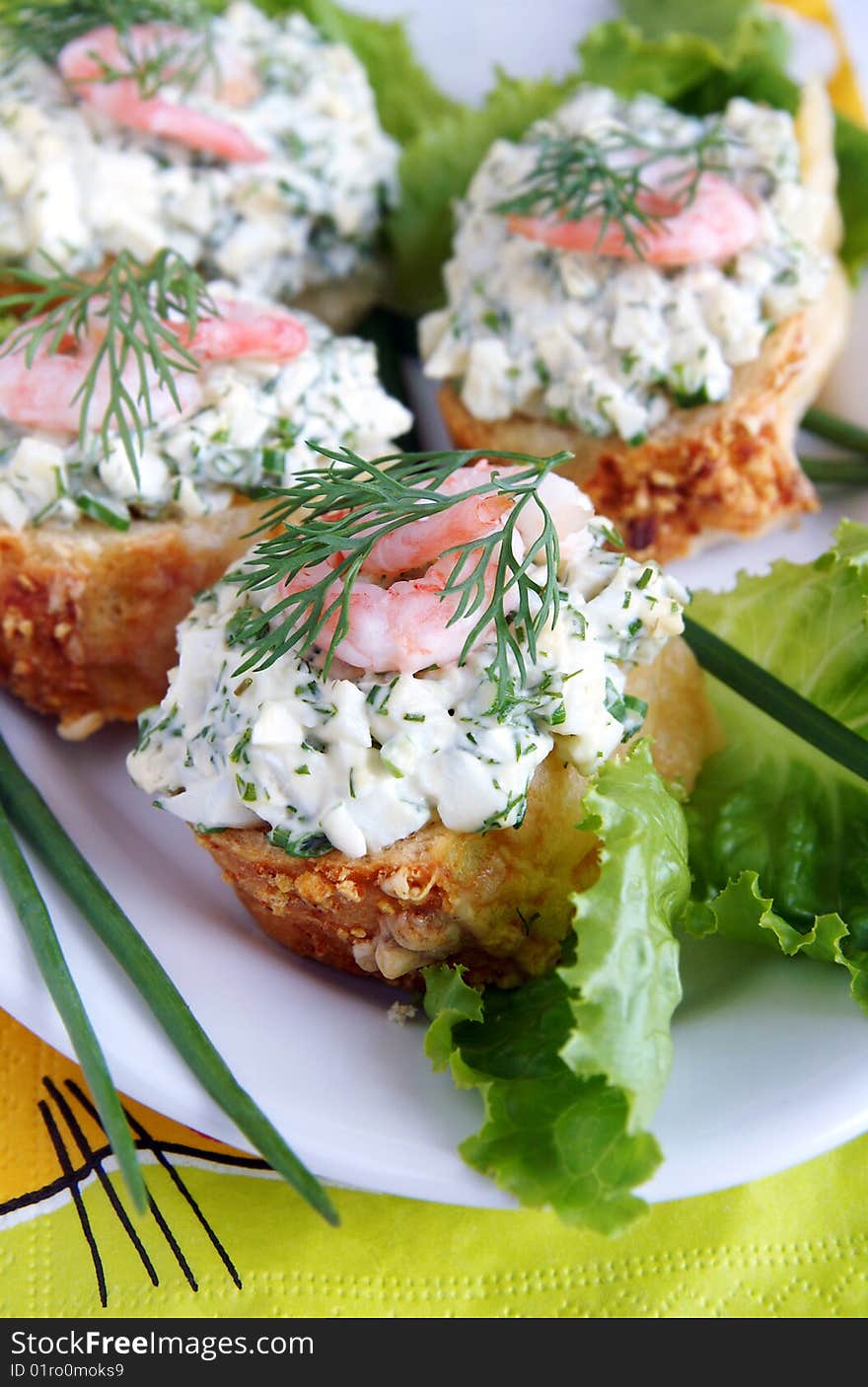 Healthy enrich sandwiches with shrimps, boiled eggs, green vegetables and herbs, blur background, vertical