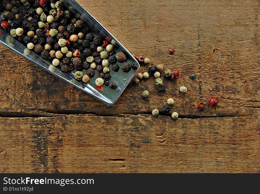 Colorful Peppercorns in a Metal Scoop