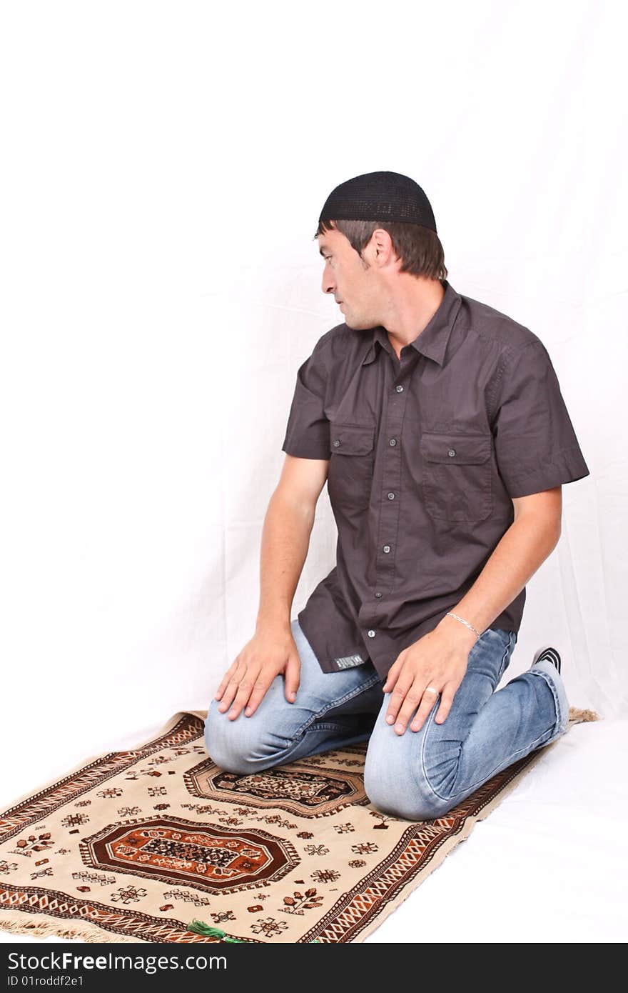 Young muslim praying in mosque. Young muslim praying in mosque