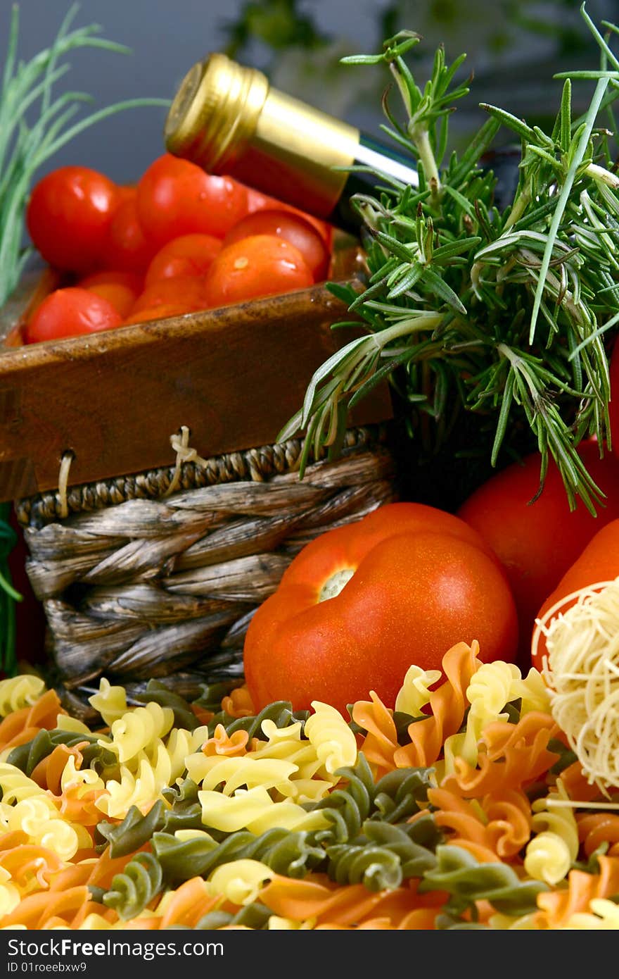 Colorful vegetables, pasta and tomato setup