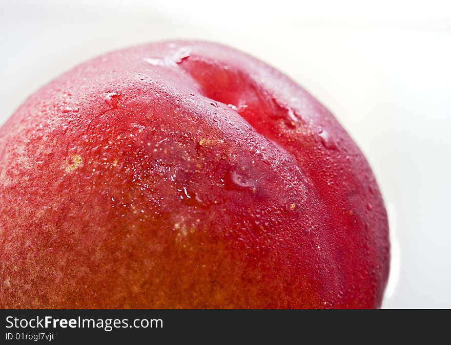 Healthy peach macro isolated on white background