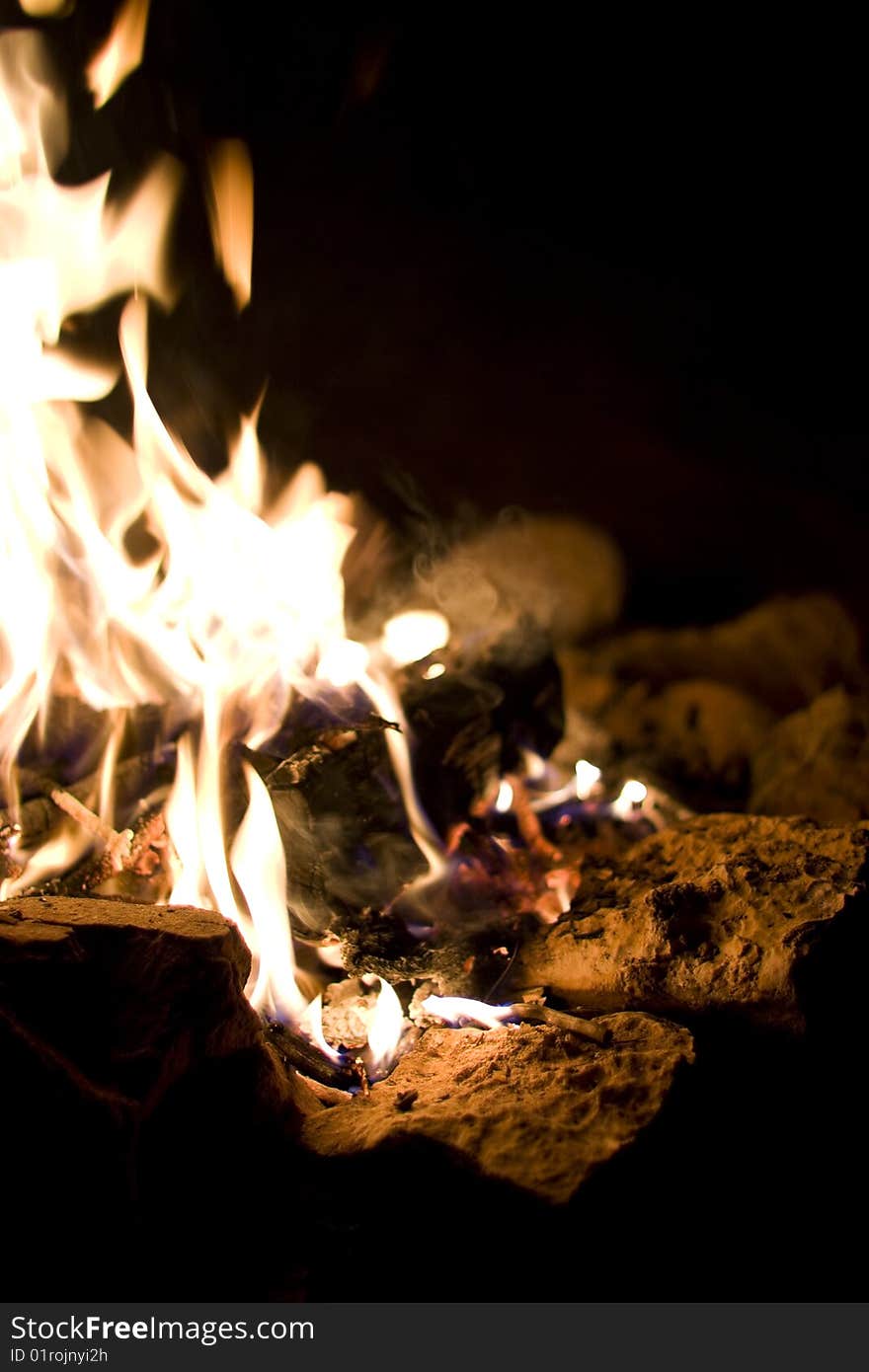 Fire Burning At Night In Campsite