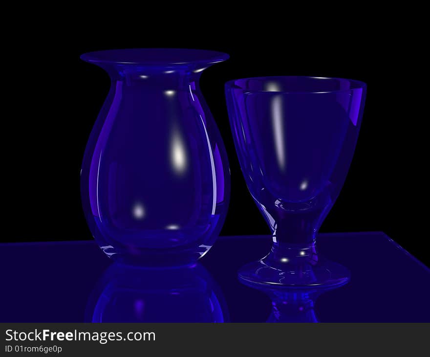 Blue glass vase and goblet on black