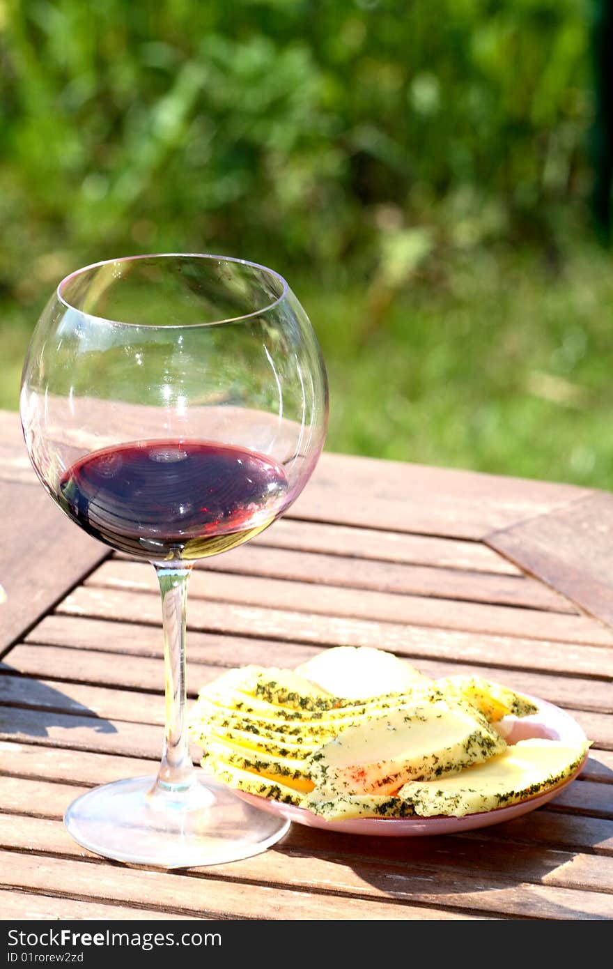 Wine and cheese on the table