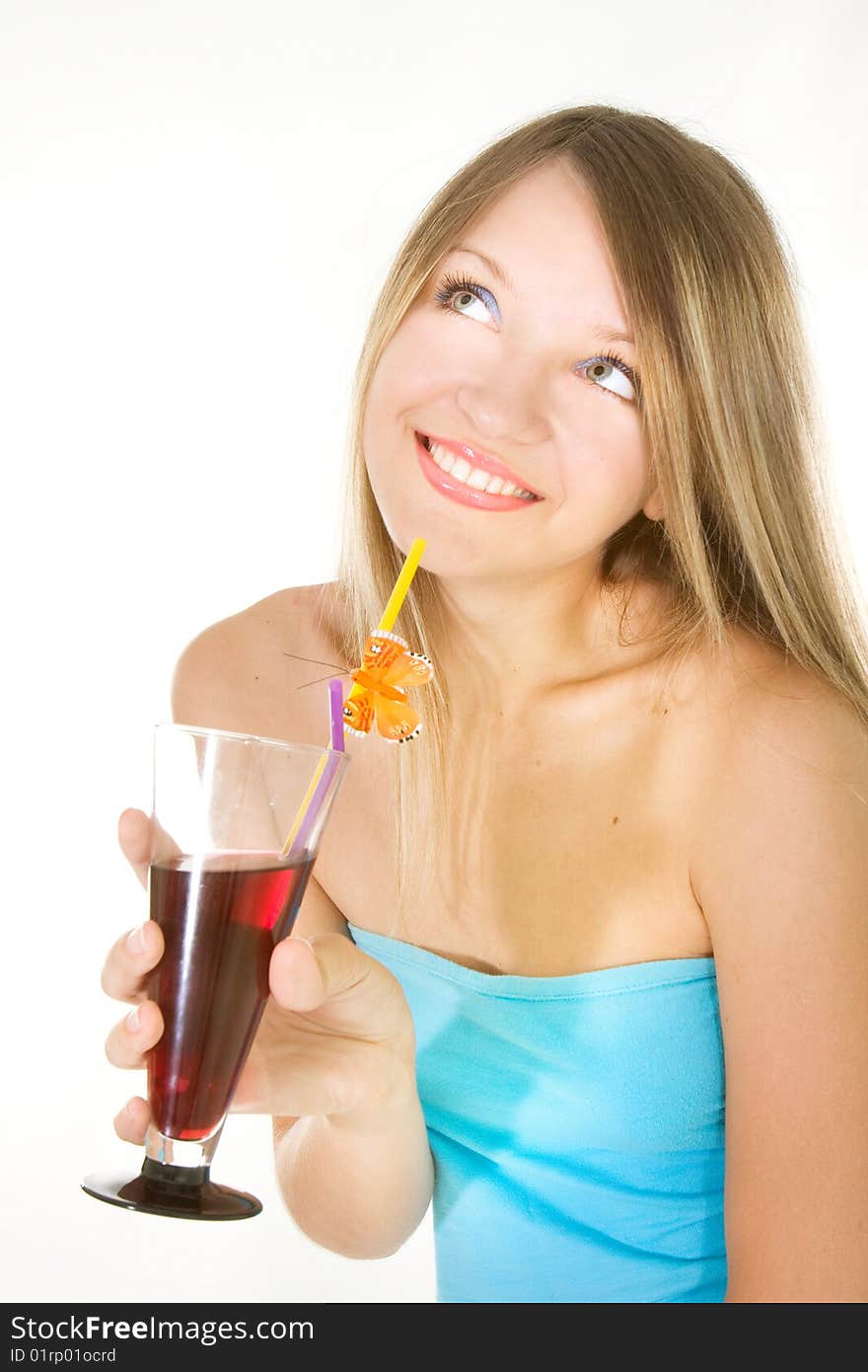 Beautiful girl with glass of juice over white