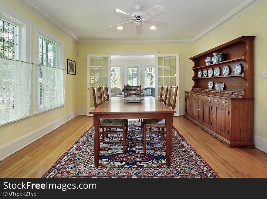 Dining room in suburban home with wood cabinetry