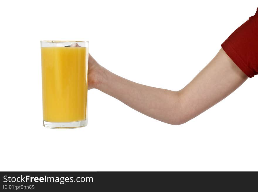 Hand keeping the jug with the orange juice. Hand keeping the jug with the orange juice