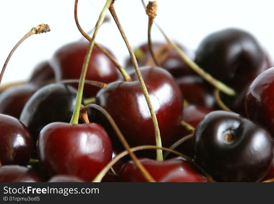 Sweet cherry on a white background. It is removed by close up at a short distance