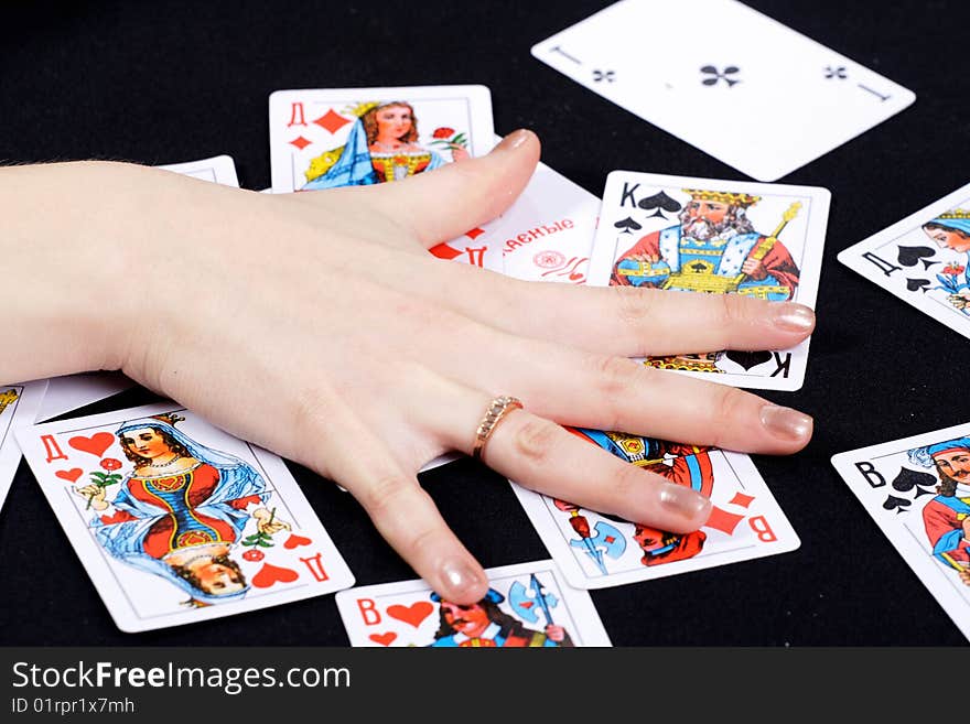 Photo of the palm on playing cards