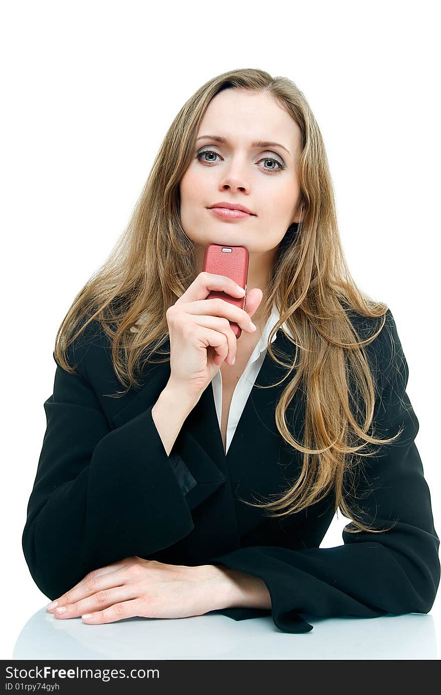 Young beauty business lady sits on the table. Young beauty business lady sits on the table