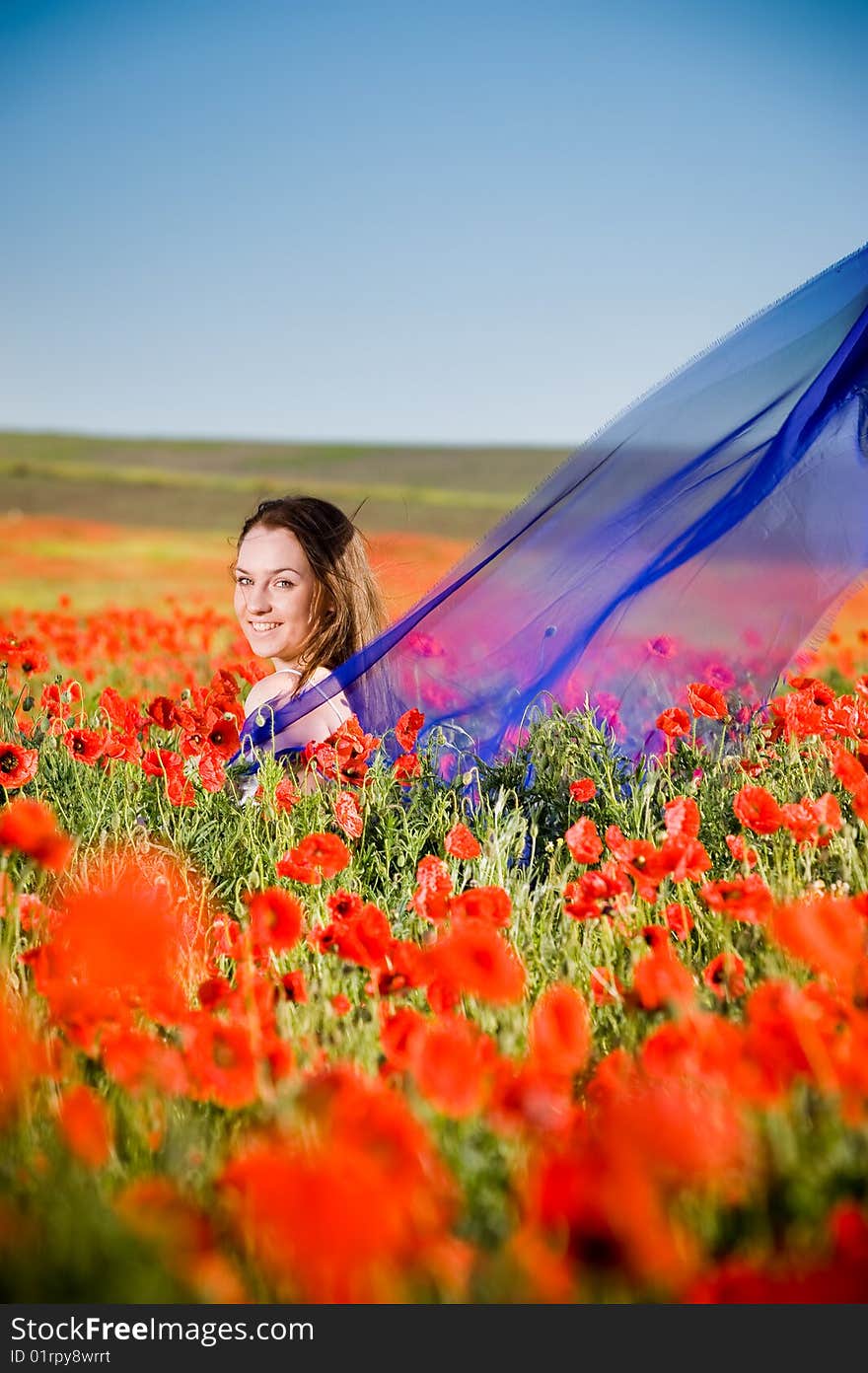 Smiling Girl In The Poppy Field