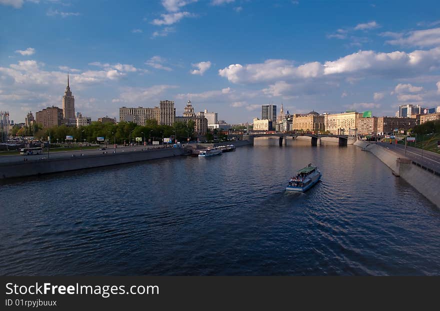 Bridge and boat at Moskva river in Moscow, Russia - panoramic. Bridge and boat at Moskva river in Moscow, Russia - panoramic