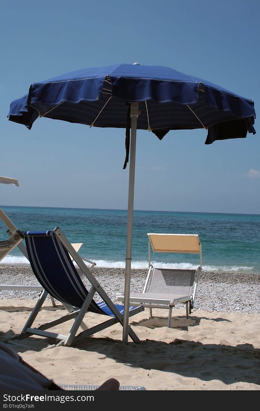 Relaxing on the italian beach of Tropea.