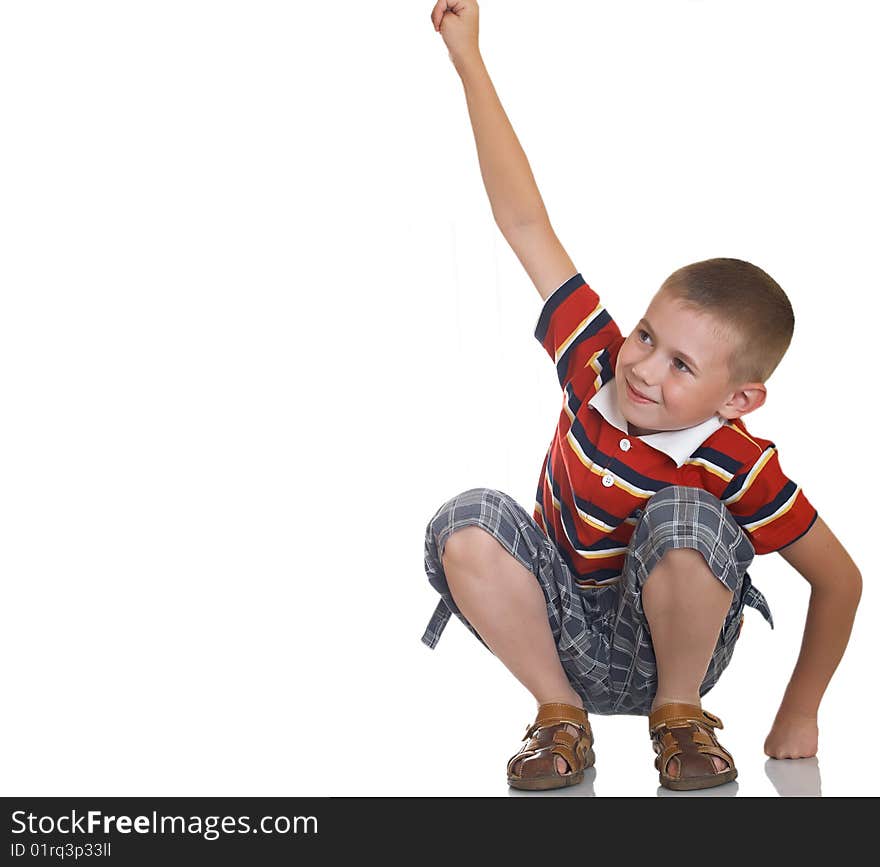 The boy shows gestures by two hands. The boy shows gestures by two hands