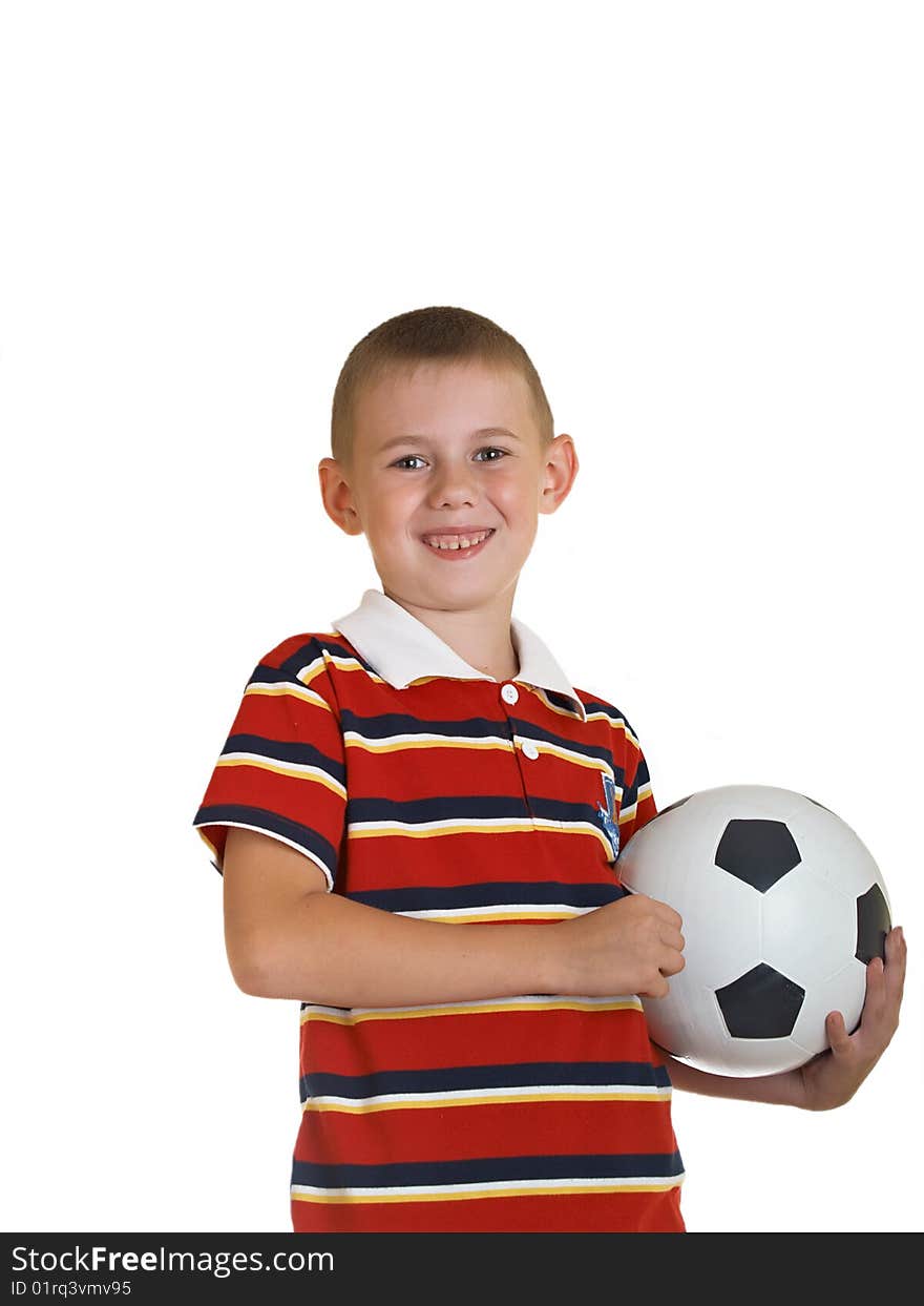 Young boy holding football in his hand. Young boy holding football in his hand