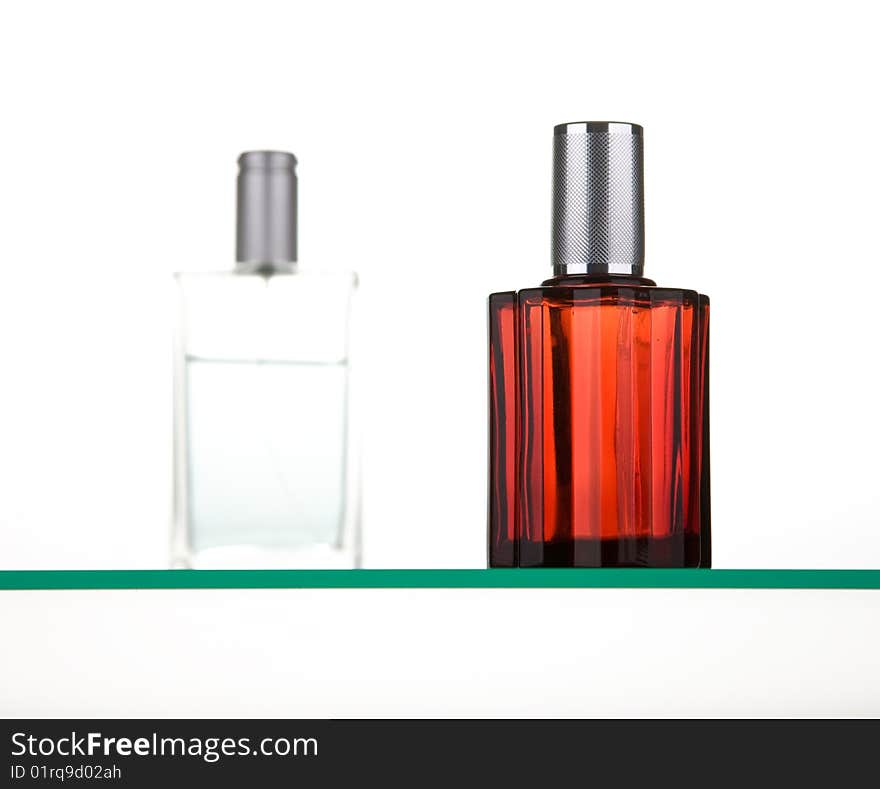 White and red  man perfume bottles