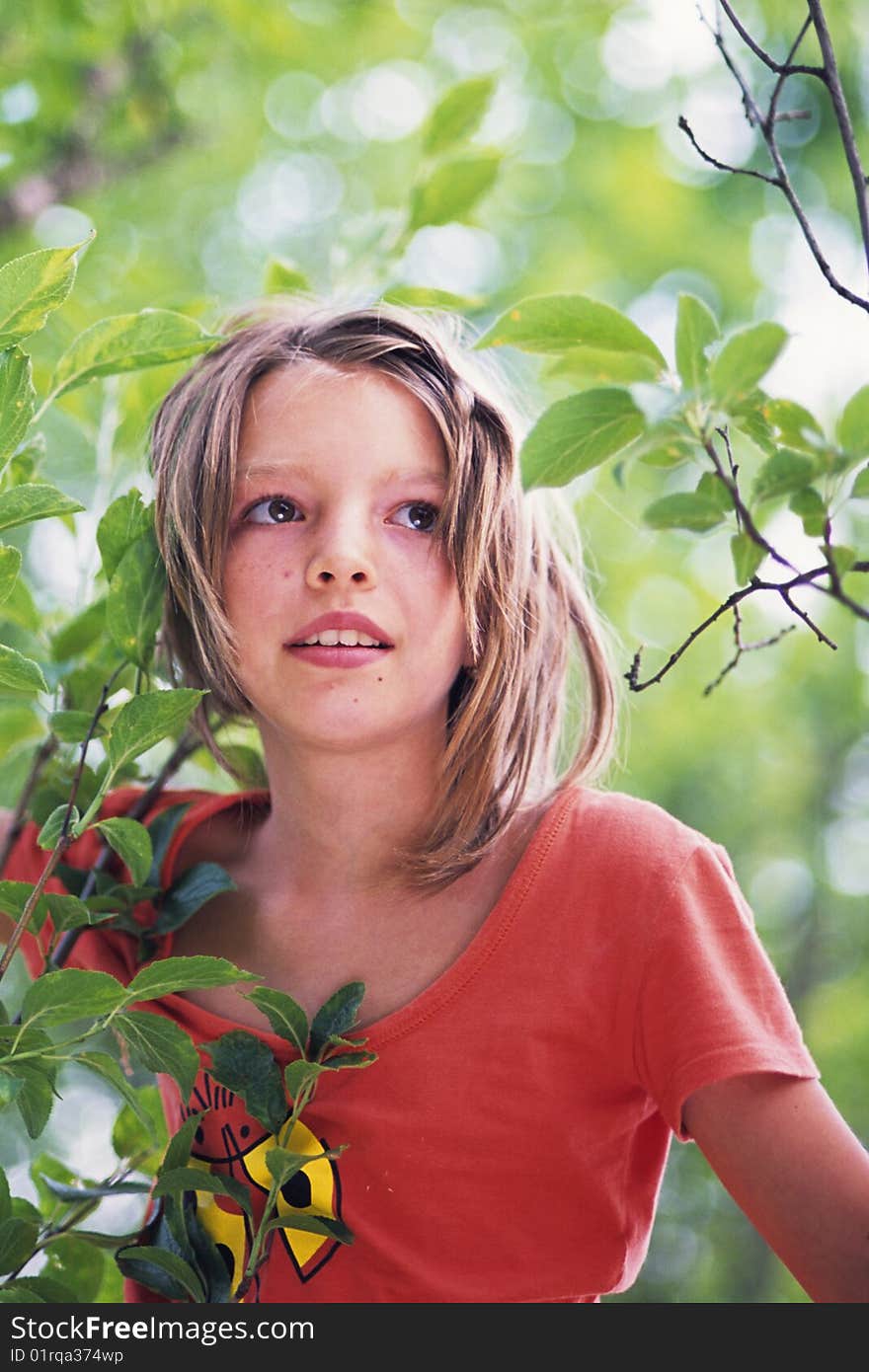 Girl standing in a tree and feeling free. Girl standing in a tree and feeling free