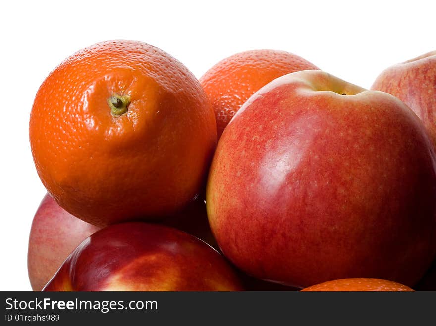 Apples and mandarins on white background