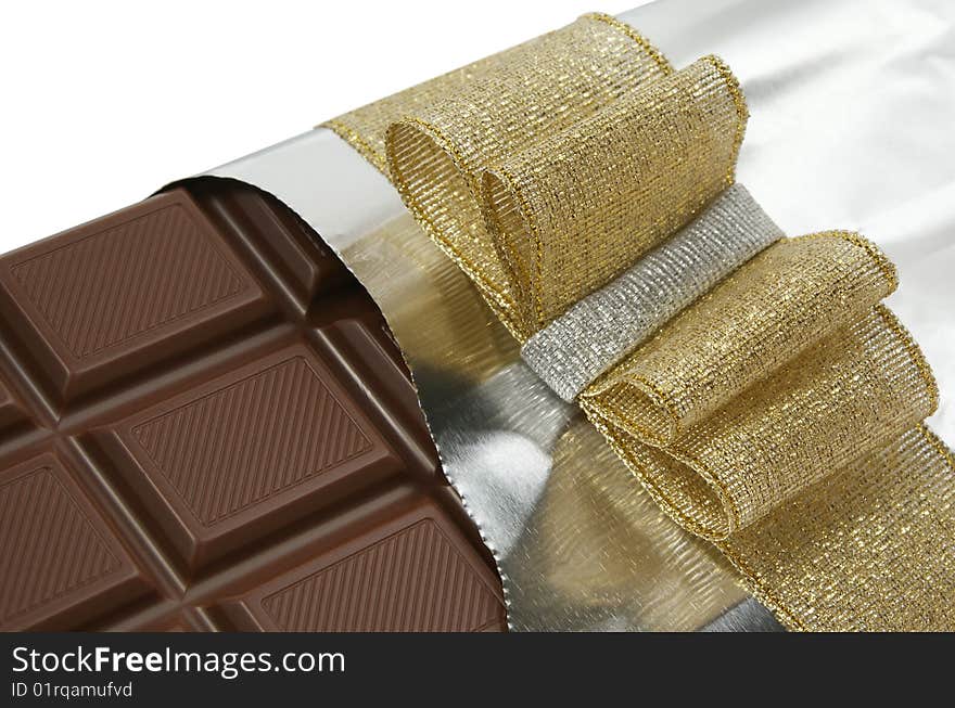 Bar of chocolate with gold bow. Bar of chocolate with gold bow