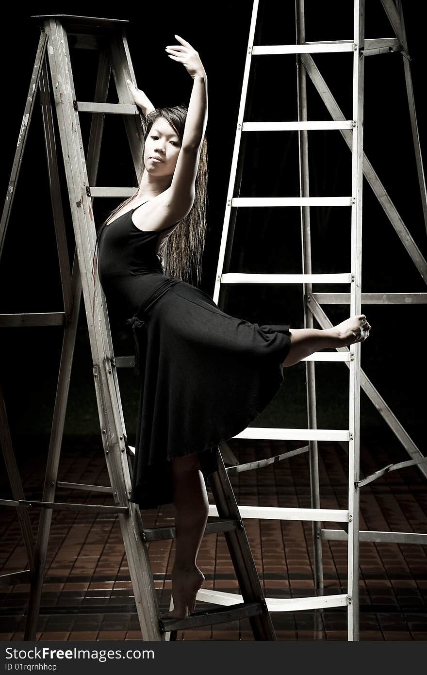 Ballet dancer on ladders